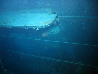 Port underwater concealed torpedo tube